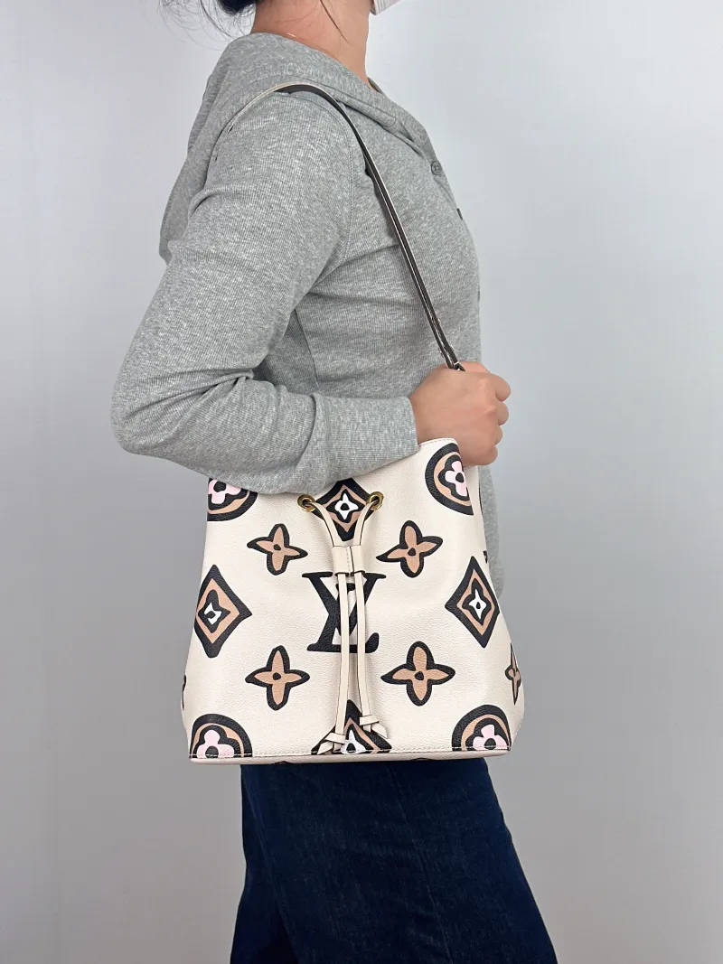 Louis Vuitton Shoulder Bag NÉONOÉ Bucket Bag PVC Medium 26 × 17.5 × 26 cm — on-model view 2 of 2