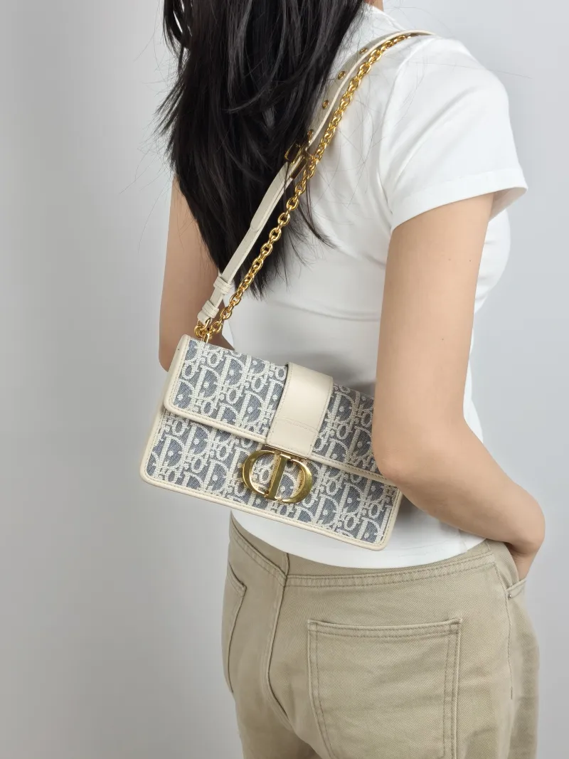 DIOR Crossbody Bag 30 Montaigne East-West 30 Blue Beige Calfskin，Canvas Small 21 × 6 × 12 cm — on-model view 2 of 3