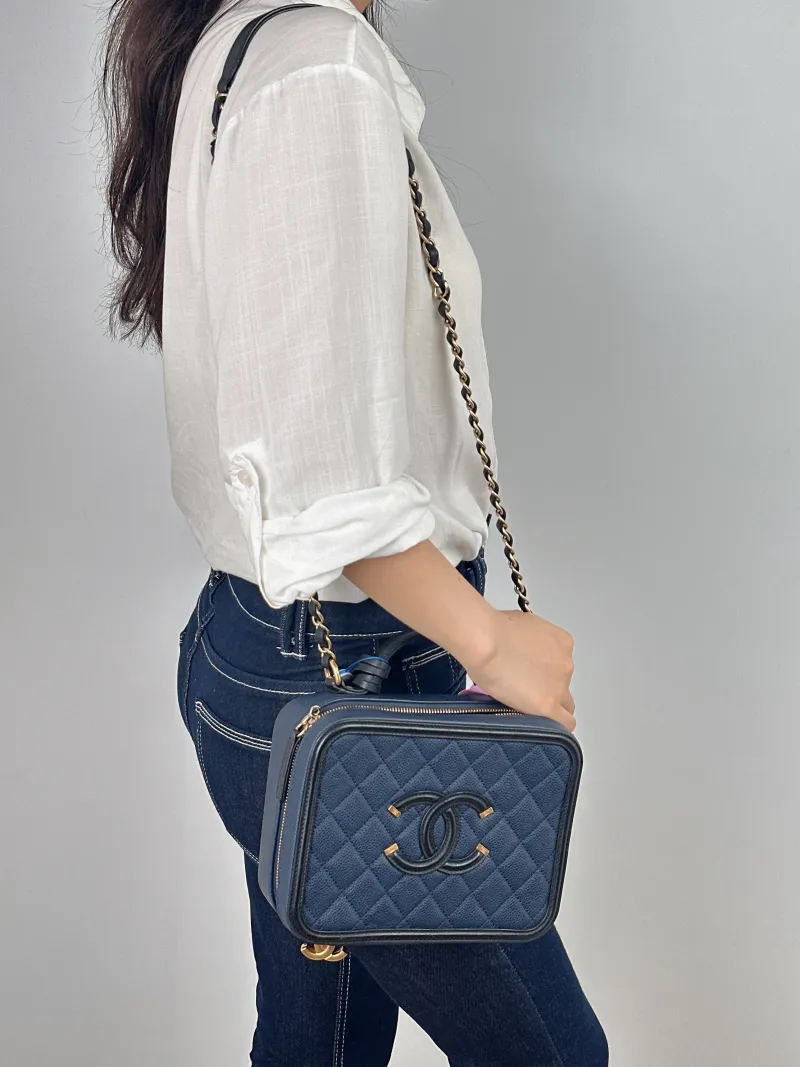 Chanel Crossbody Bag CC Filigree Vanity Cosmetic Bag Blue Black Grained Calfskin Medium 21 × 8 × 16 cm 22 — on-model view 1 of 2