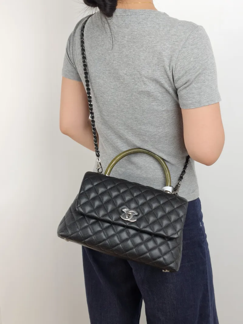 Chanel Top Handle Bag Coco Handle​ Black Grained Calfskin Medium 29 × 12 × 18 cm 23 — on-model view 2 of 3