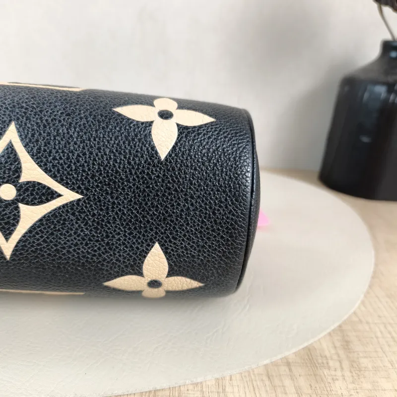 Louis Vuitton Crossbody Bag Papillon Black · White Monogram Empreinte Embossed Calfskin BB 20 × 10 × 10 cm — detail view 1 of 12