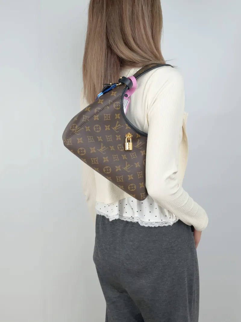Louis Vuitton Shoulder Bag The Drop Monogram PVC Small28 × 12 × 15 cm — on-model view 3 of 3
