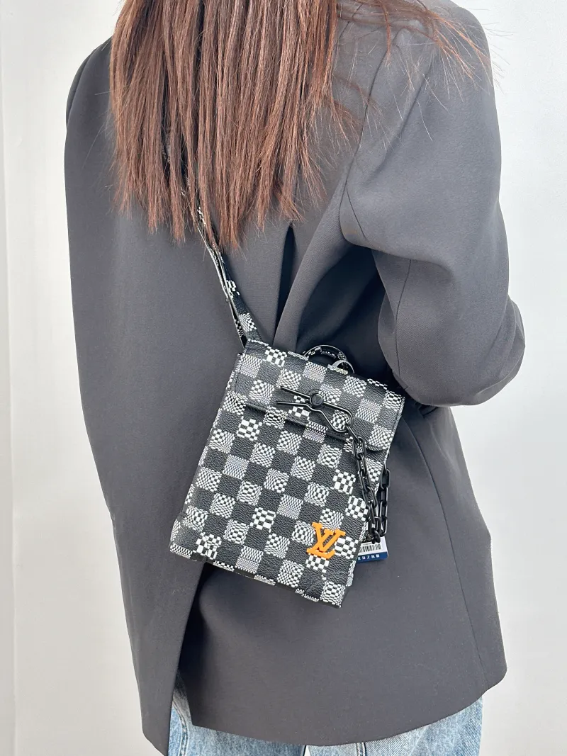 Louis Vuitton Shoulder Bag Nano Steamer Shoulder Bag Colorblock PVC nano 15 × 7 × 18 cm — on-model view 1 of 2