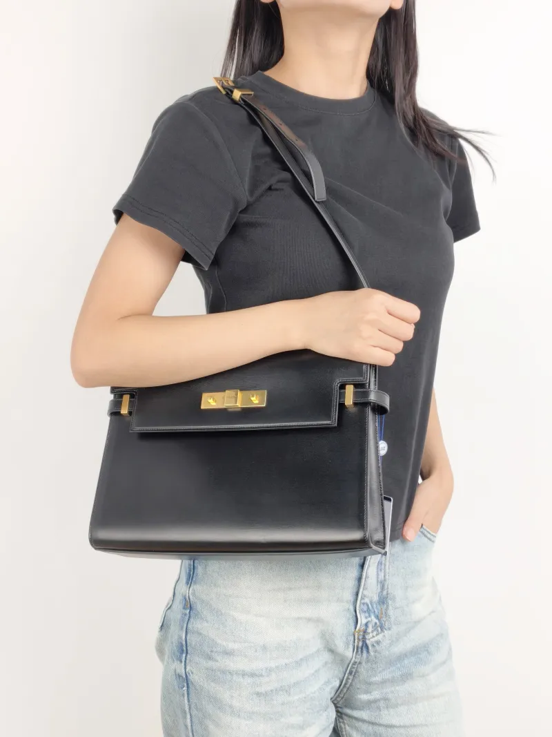 SAINT LAURENT Shoulder Bag MANHATTAN Black Calfskin Medium 29 × 7.5 × 20 cm — on-model view 1 of 2