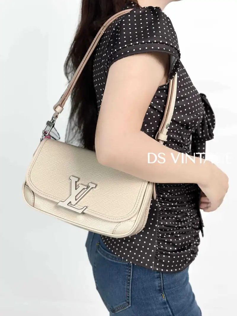 Louis Vuitton Shoulder Bag BUCI Beige Epi Embossed Calfskin One Size 24.5 × 9 × 15.5 cm — on-model view 1 of 3