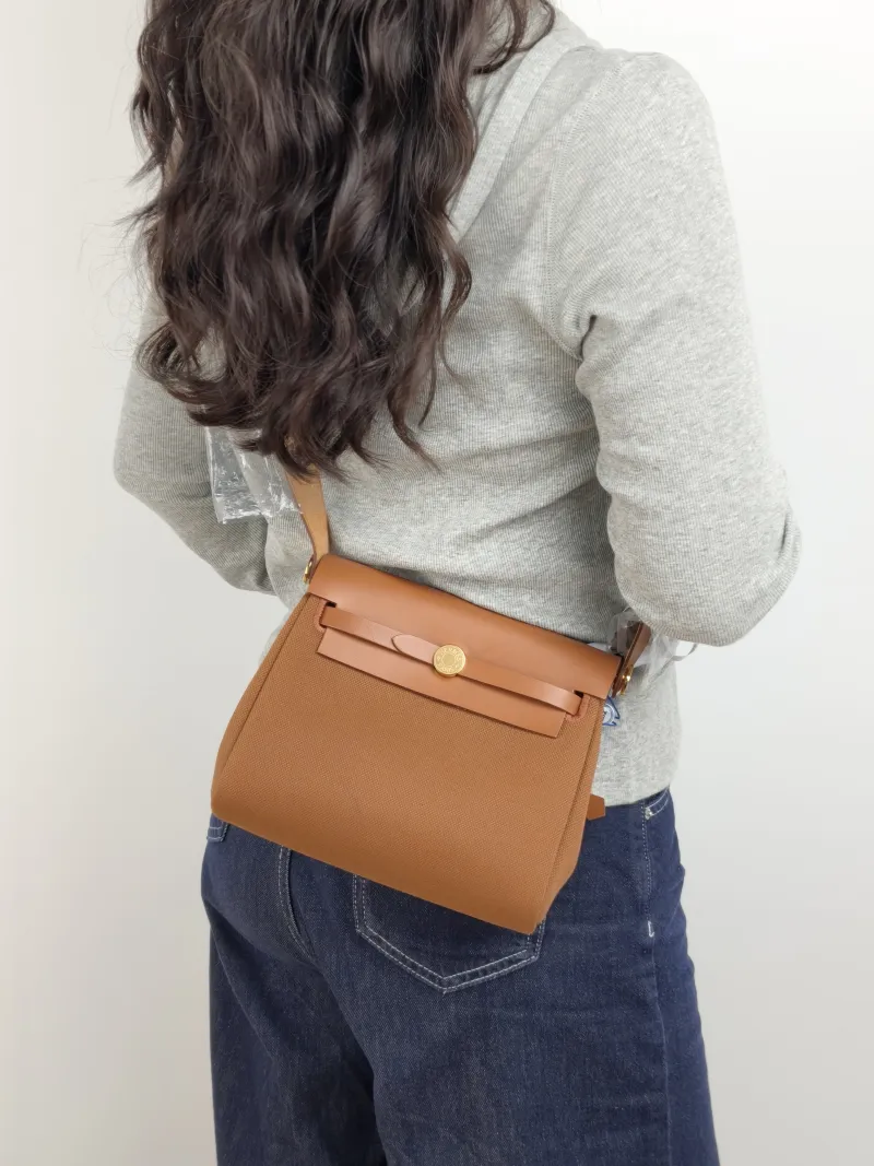 Hermès Crossbody Bag Herbag Zip 20 37 Brown Calfskin，Canvas Mini 20.5 × 7 × 16.5 cm G — on-model view 2 of 2