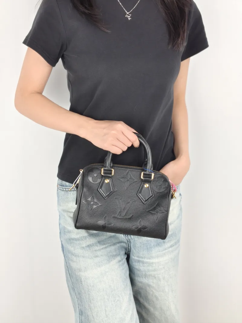 Louis Vuitton Crossbody Bag Speedy20Black Calfskin Small20.5 × 12 × 13.5 cm — on-model view 2 of 3