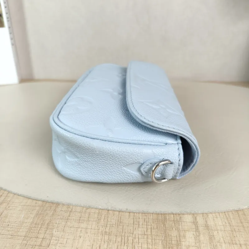 Louis Vuitton Crossbody Bag IVY Blue Empreinte Embossed Calfskin Small 23.5 × 4.3 × 12 cm — detail view 2 of 13