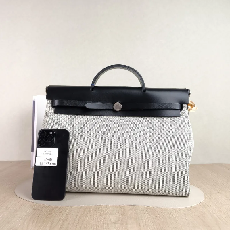 Hermès Top Handle Bag herbag messenger 39 Top Handle Bag Beige Black Canvas · Calfskin One Size 36 × 9 × 28 cm k — cover view 5 of 5