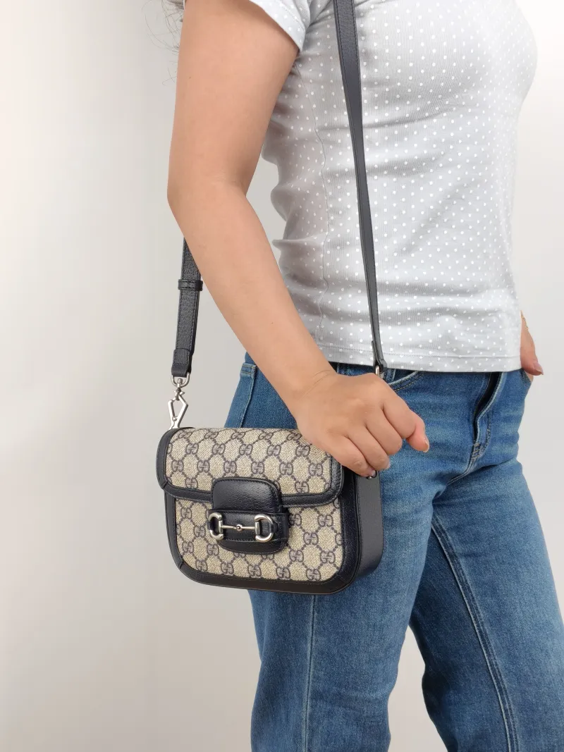 GUCCI Crossbody Bag Horsebit 1955 Horsebit Small Blue Monogram PVC Small 20.5 × 5 × 14.5 cm — on-model view 1 of 2