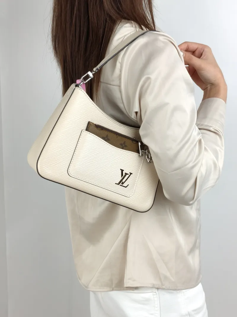 Louis Vuitton Crossbody Bag MARELLE White Epi Embossed Calfskin Small 25 × 8 × 15 cm — on-model view 1 of 3