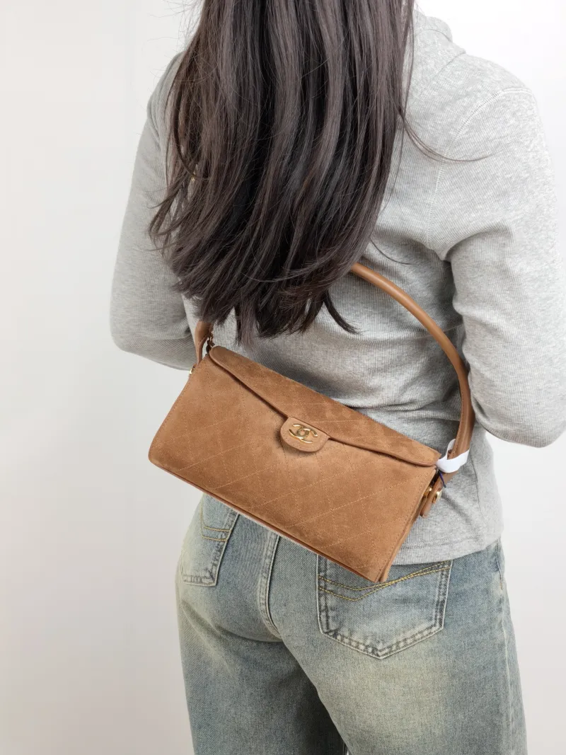 Chanel Shoulder Bag Baguette Bag Brown Suede One Size 23 × 11 × 11 cm — on-model view 2 of 3