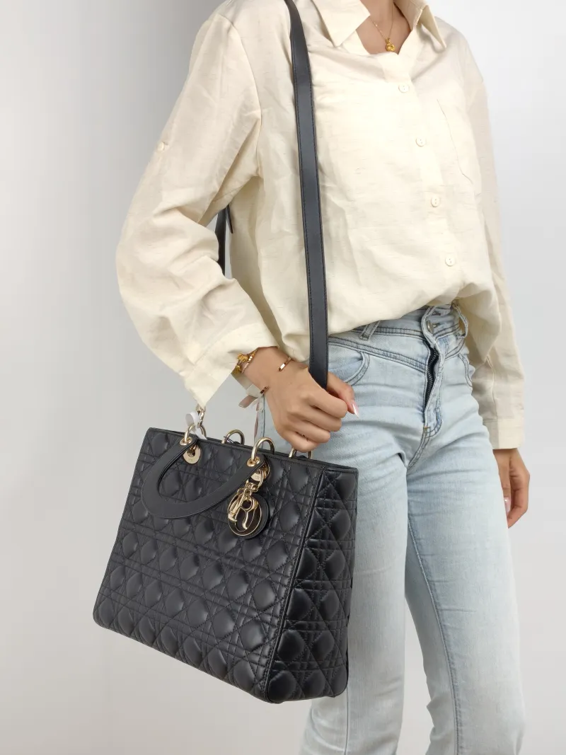 DIOR Top Handle Bag Lady Lady Dior Bag Black Lambskin Large 32 × 11 × 25 cm — on-model view 2 of 2