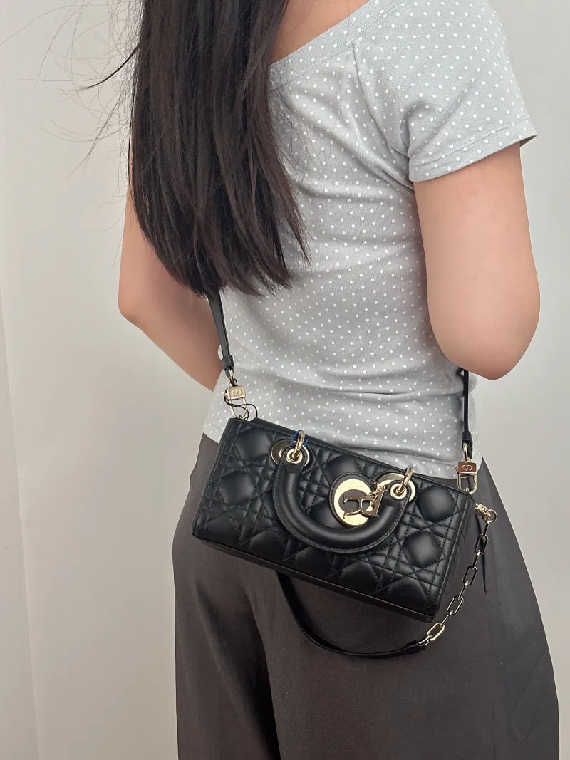 DIOR Top Handle Bag Lady D-Joy Black Lambskin Small 22 × 6 × 11 cm — on-model view 2 of 3