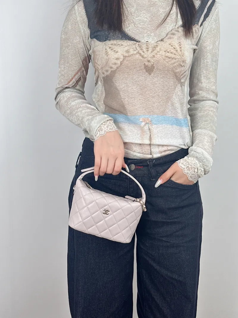 Chanel Crossbody Bag Crossbody Bag Pink Calfskin21.5 × 7.5 × 19 cm — on-model view 2 of 2