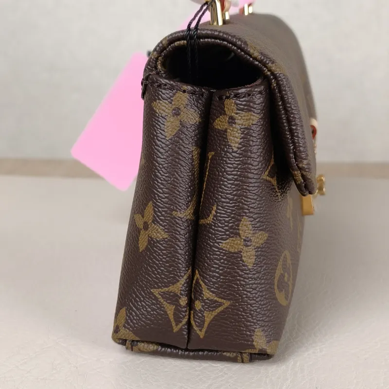 Louis Vuitton Crossbody Bag MADELEINE Monogram PVC nano 21 × 6 × 12.5 cm — detail view 6 of 11