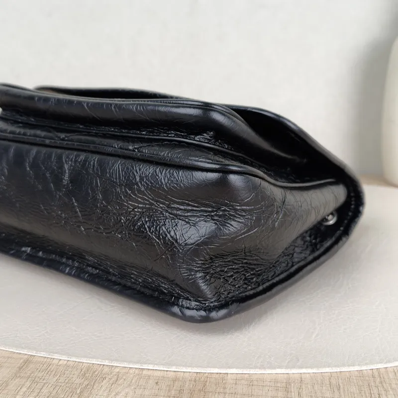 SAINT LAURENT Crossbody Bag Niki Black Waxed Leather Calfskin Small 21 × 7.5 × 16 cm — detail view 11 of 13