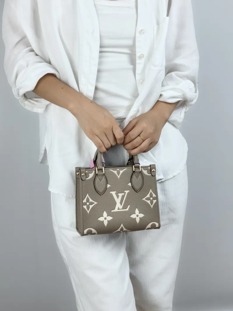 Louis Vuitton Crossbody Bag Onthego BB · White Empreinte Embossed Calfskin BB 18 × 8.5 × 15 cm — on-model view 2 of 2