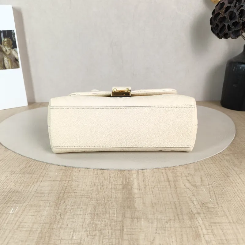 Louis Vuitton Crossbody Bag MADELEINE Beige Monogram Empreinte Embossed Calfskin BB 24 × 8.5 × 17 cm — cover view 2 of 5