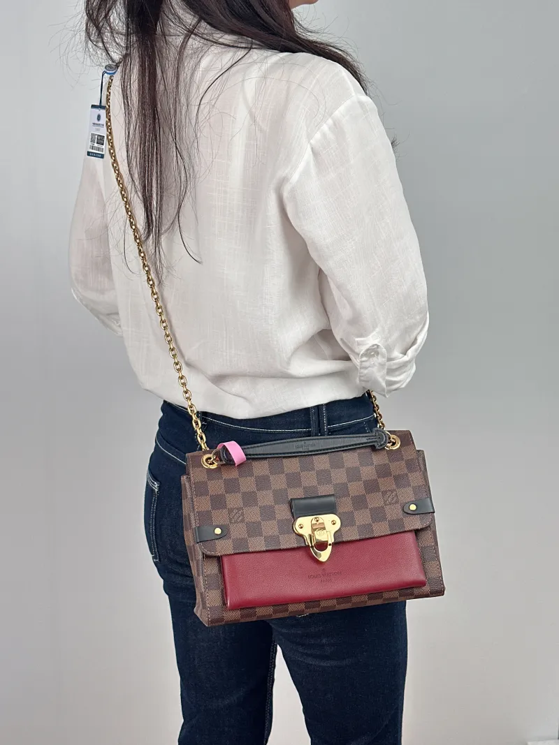 Louis Vuitton Shoulder Bag VAVIN Red · PVC Small 25 × 9.5 × 17 cm — on-model view 1 of 2
