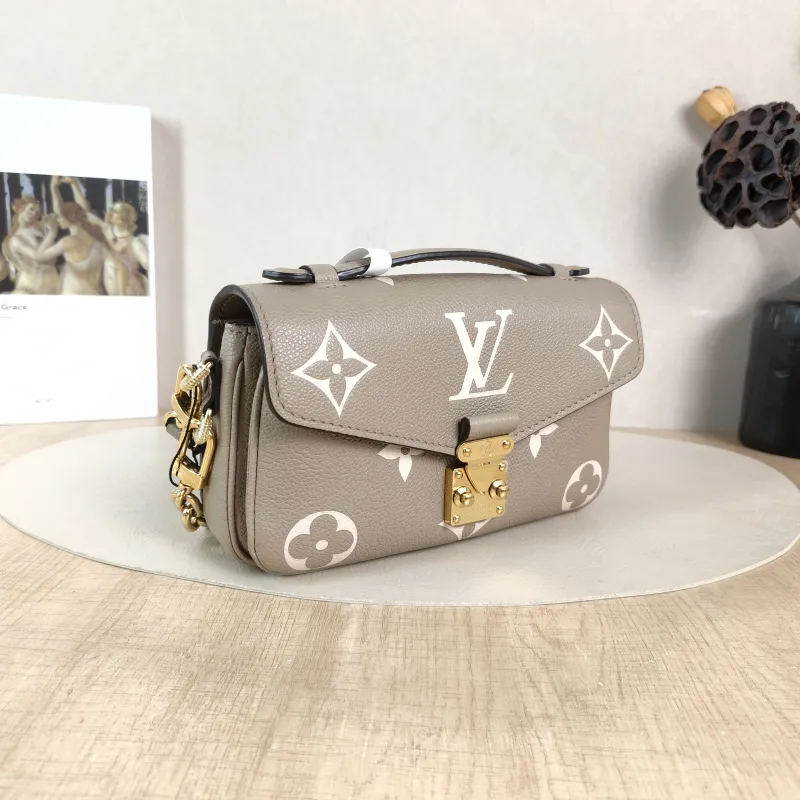 Louis Vuitton Crossbody Bag Pochette Métis East West Monogram Empreinte Embossed Calfskin Small 21.5 × 6 × 13.5 cm — cover view 2 of 6