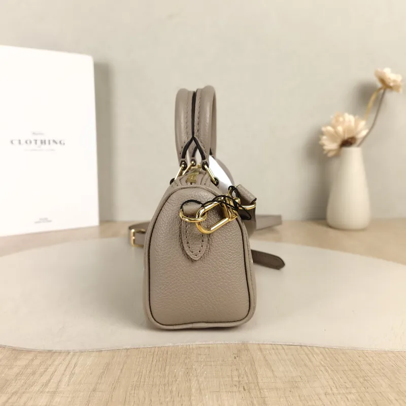 Louis Vuitton Crossbody Bag Speedy Nano · White Empreinte Embossed Calfskin Monogramnano16 × 7.5 × 10 cm — detail view 6 of 11