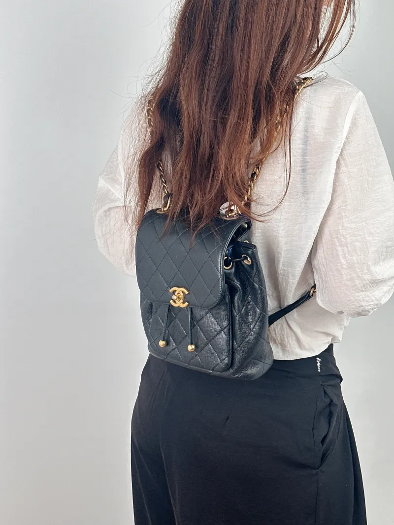 Chanel Backpack Backpack Black Grained Calfskin Small 19 × 9.5 × 21.5 cm — on-model view 1 of 3