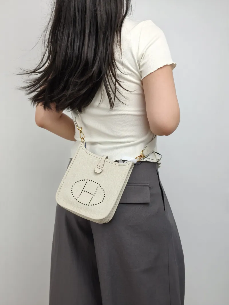 Hermès Crossbody Bag Evelyne Mini 16 Mini 16 10Craie TC Calfskin Mini 17 × 5.5 × 18 cm G — on-model view 1 of 2
