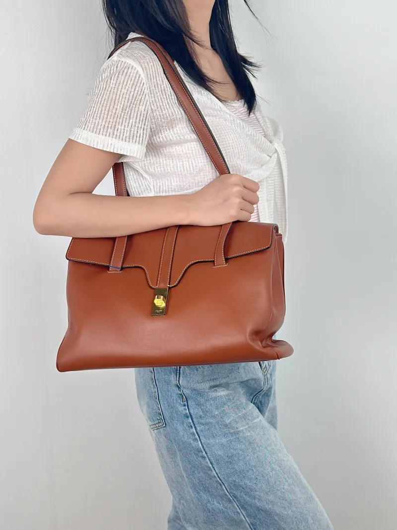 CELINE Shoulder Bag Soft 16Shoulder Bag Caramel Calfskin Medium32 × 15 × 24 cm — on-model view 1 of 2