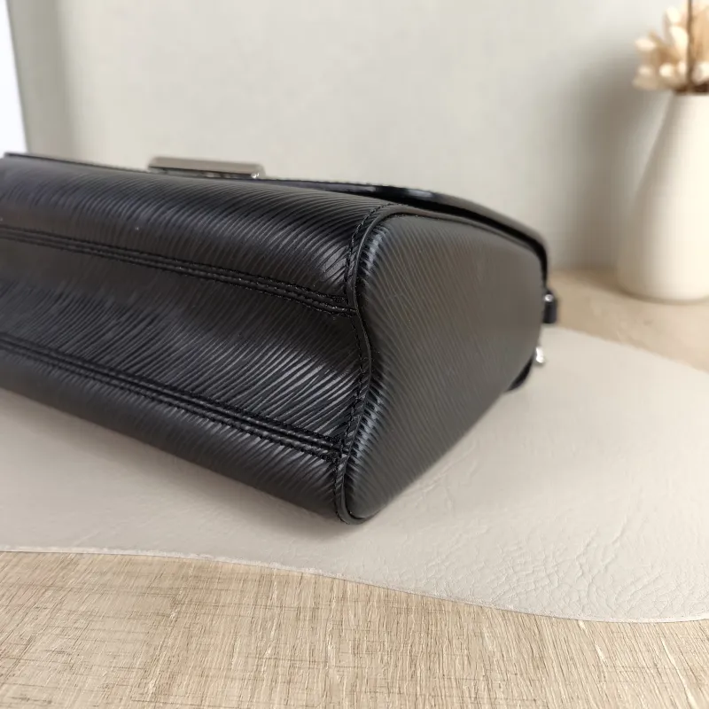 Louis Vuitton Crossbody Bag Twist Black Epi Embossed Calfskin Medium 23 × 9.5 × 17 cm — detail view 8 of 12