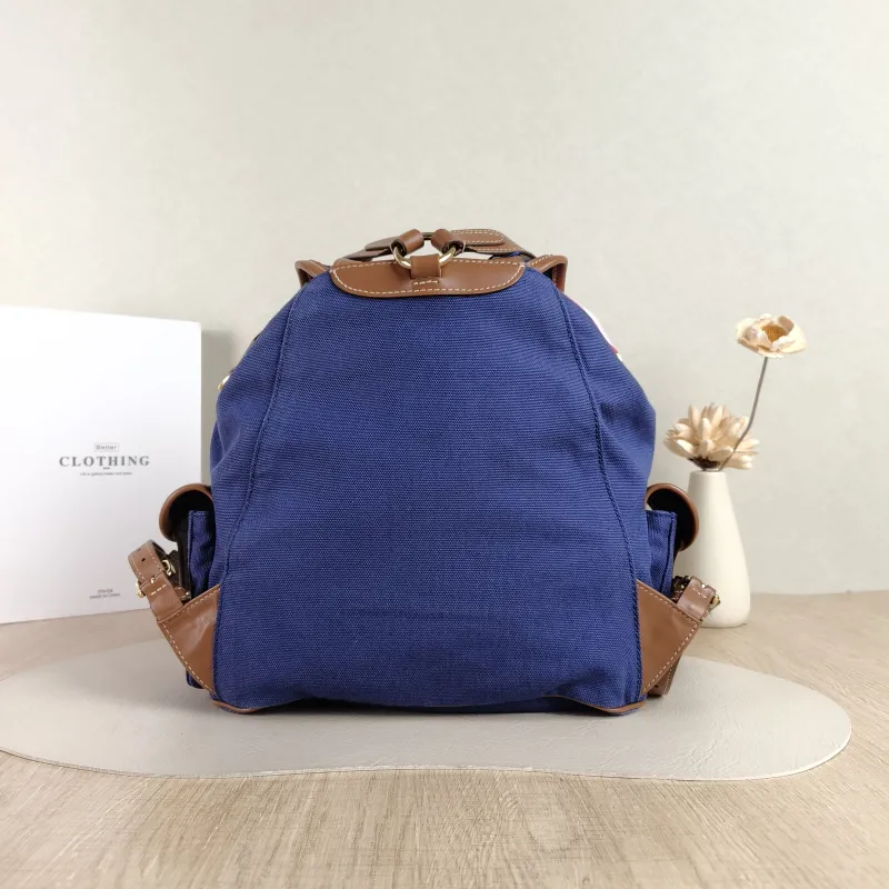 Miumiu Backpack Backpack Blue Canvas Large 25 × 12.5 × 29.5 cm — cover view 2 of 5