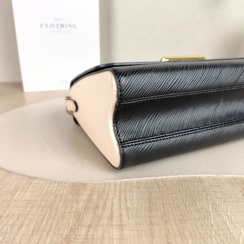 Louis Vuitton Crossbody Bag Crafty Twist Black · White Epi Embossed Calfskin Medium 23 × 9.5 × 17 cm — detail view 10 of 11