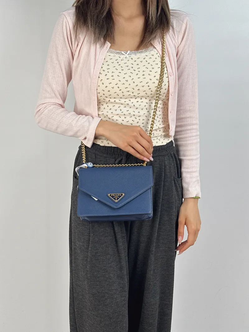 PRADA Crossbody Bag Crossbody Bag Clutch Blue Calfskin One Size20 × 7 × 14 cm — on-model view 2 of 2