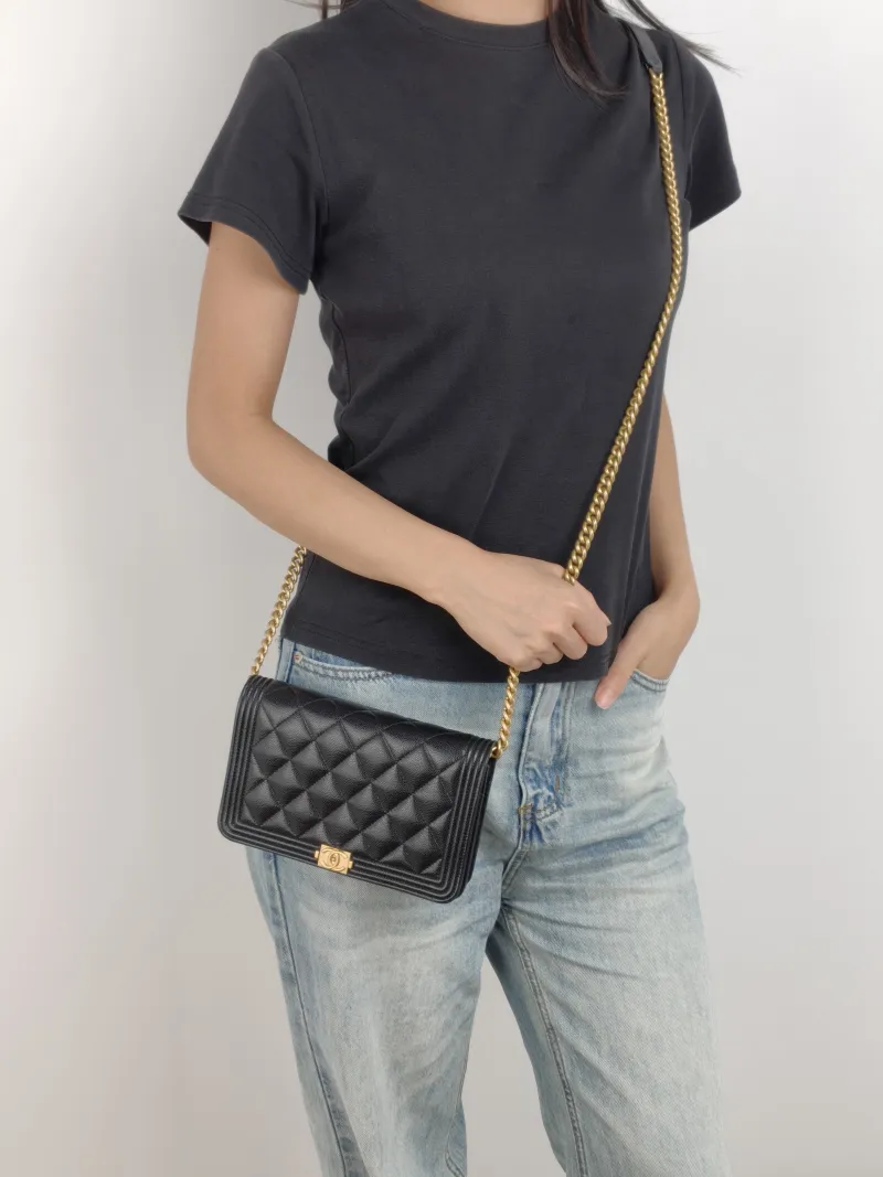 Chanel Crossbody Bag Le Boy​ WOC Black Grained Calfskin Mini 19.2 × 3.5 × 12.3 cm — on-model view 2 of 2