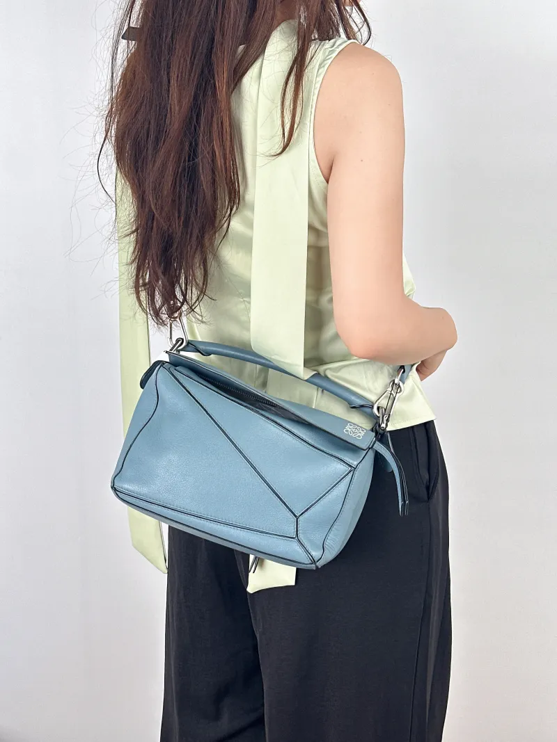 LOEWE Crossbody Bag Puzzle Blue CC alfskin Small24 × 10.5 × 16.5 cm — on-model view 2 of 2