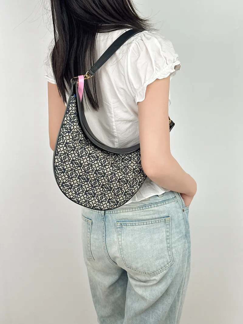 LOEWE Shoulder Bag luna Shoulder Bag Black Canvas One Size 30 × 8 × 28 cm — on-model view 1 of 2