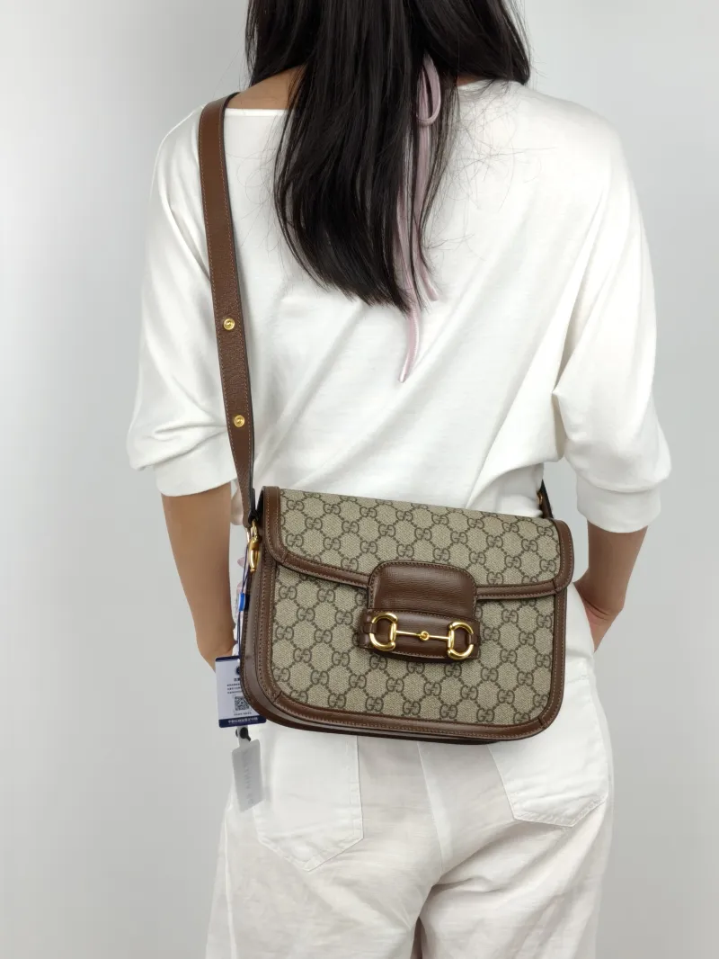 GUCCI Shoulder Bag Horsebit 1955 Horsebit Medium Monogram PVC Medium 25 × 8 × 18 cm — on-model view 2 of 3