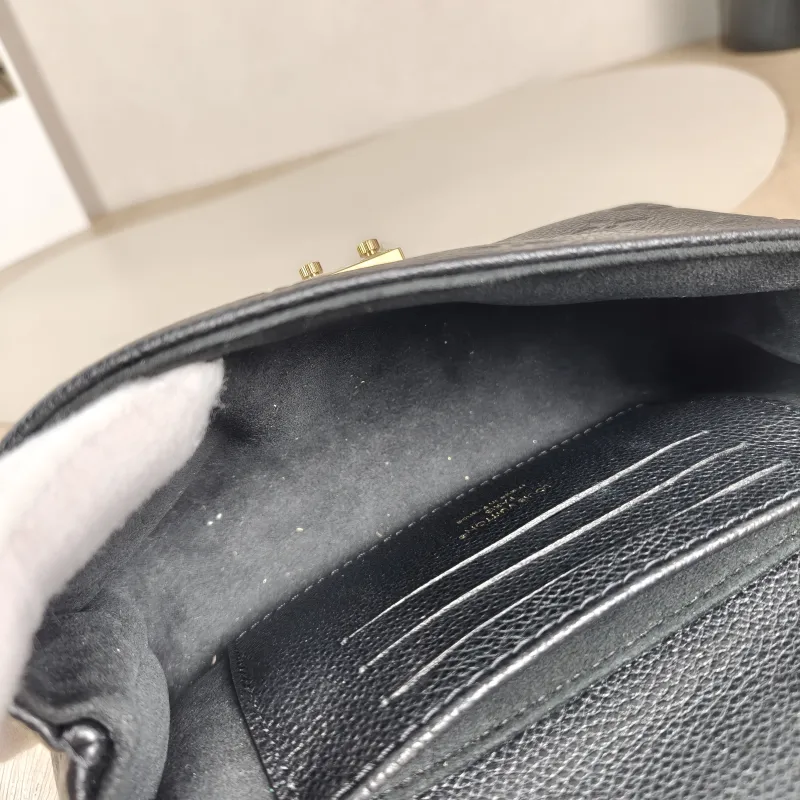Louis Vuitton Crossbody Bag MADELEINE Black Monogram Empreinte Embossed Calfskin nano 21 × 6 × 12.5 cm — detail view 10 of 14