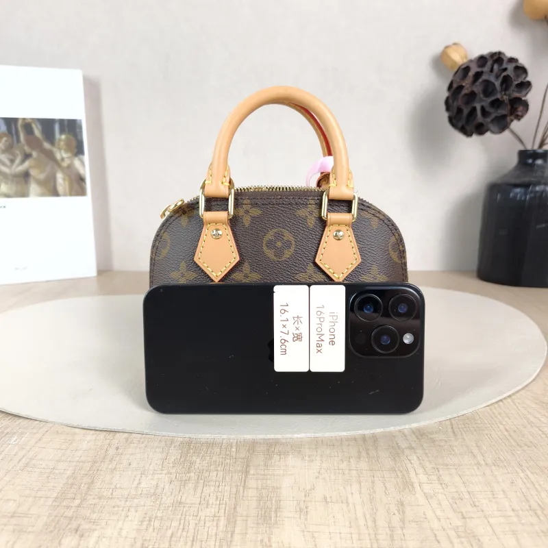 Louis Vuitton Crossbody Bag Alma Nano Monogram PVC nano 18 × 8 × 12 cm — cover view 5 of 5