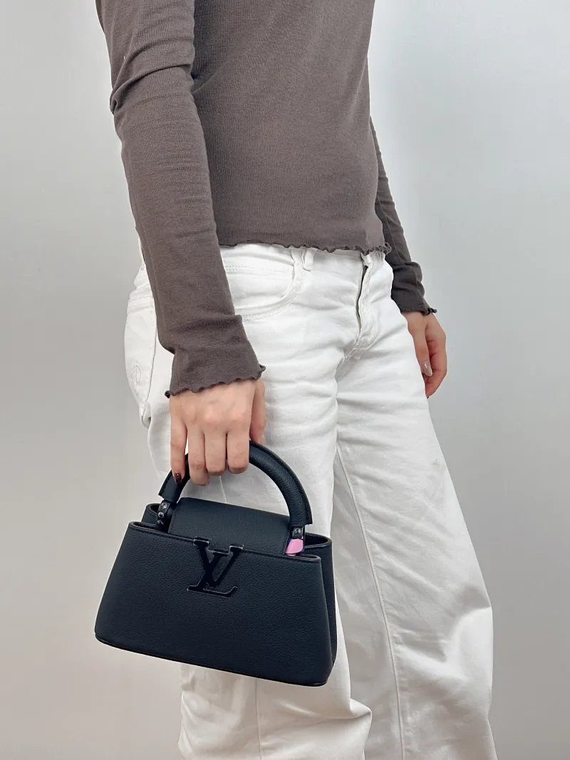 Louis Vuitton Crossbody Bag Capucines East West Black Calfskin Mini 22 × 8 × 12 cm — on-model view 2 of 2