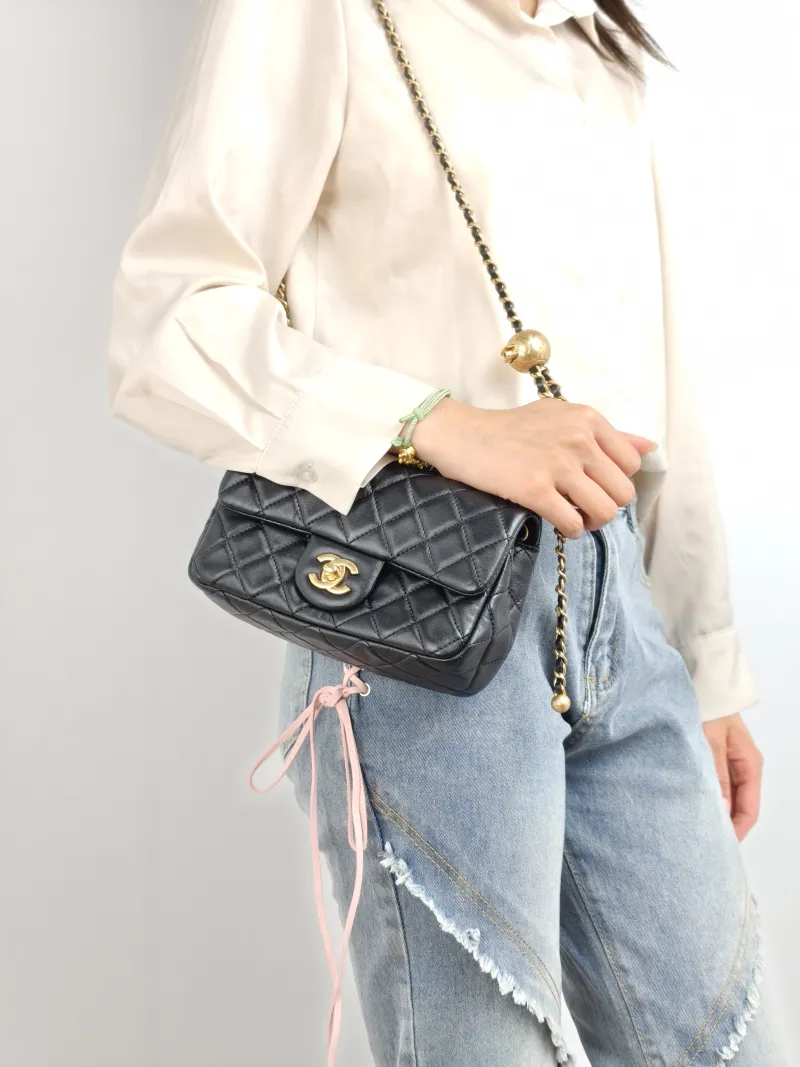 Chanel Crossbody Bag Classic Flap Large Mini CF Mini Black with Gold-Tone Hardware Lambskin mini 20 × 6 × 12 cm 29 — on-model view 1 of 2