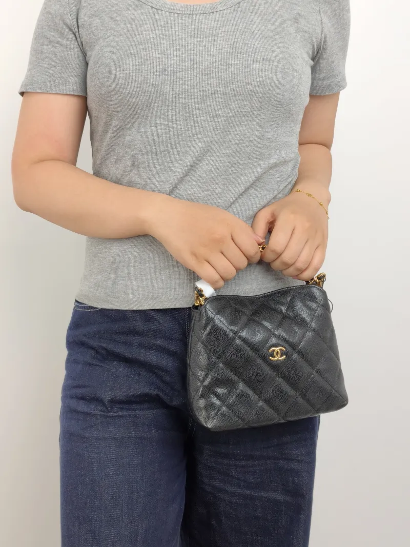 Chanel Crossbody Bag Woven Black Grained Calfskin One Size 18.5 × 7 × 14.5 cm — on-model view 3 of 3