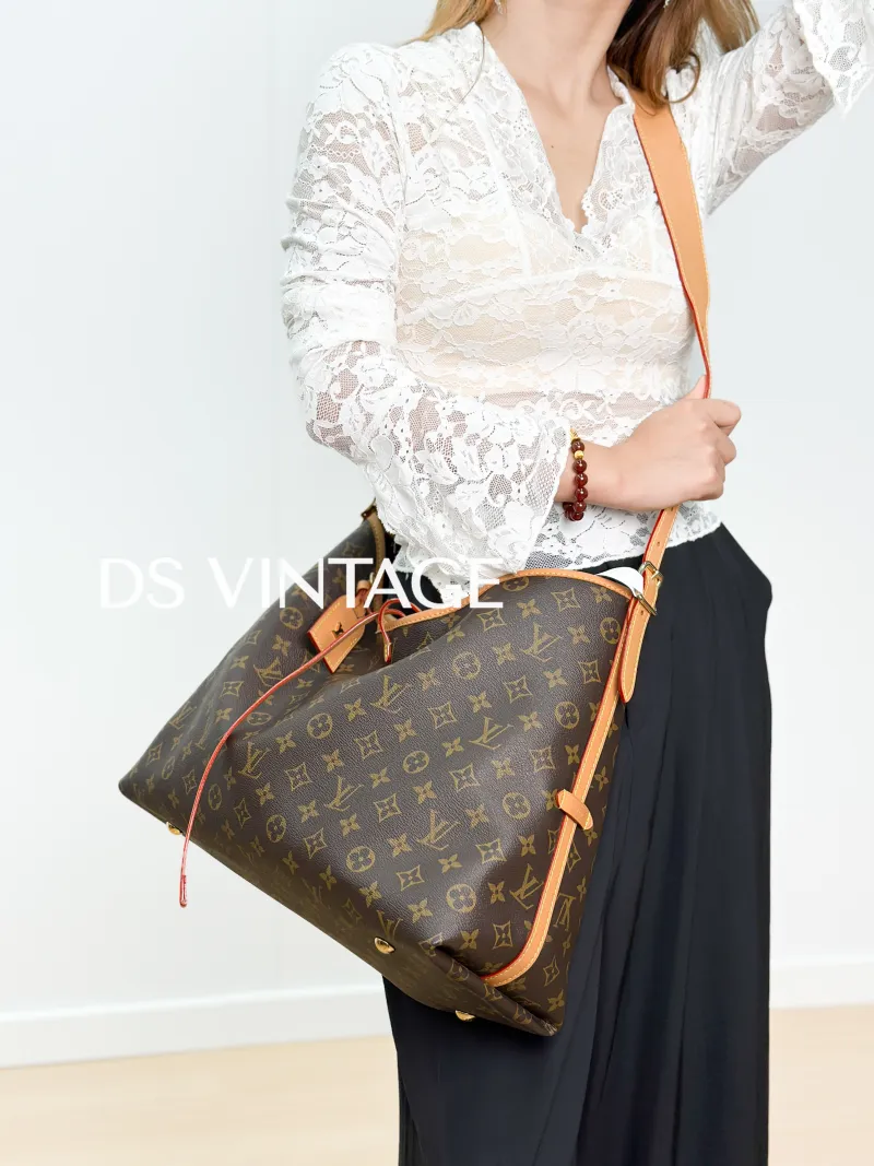 Louis Vuitton Crossbody Bag Carryall Monogram PVC Medium 39 × 15 × 30 cm — on-model view 1 of 6