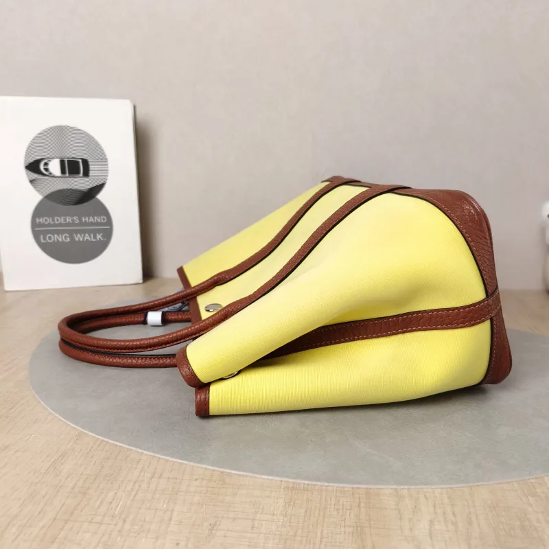 Hermès Top Handle Bag Garden Party 30 30 Canvas · Negonda Calfskin Medium30 × 13 × 21 cm — detail view 8 of 12