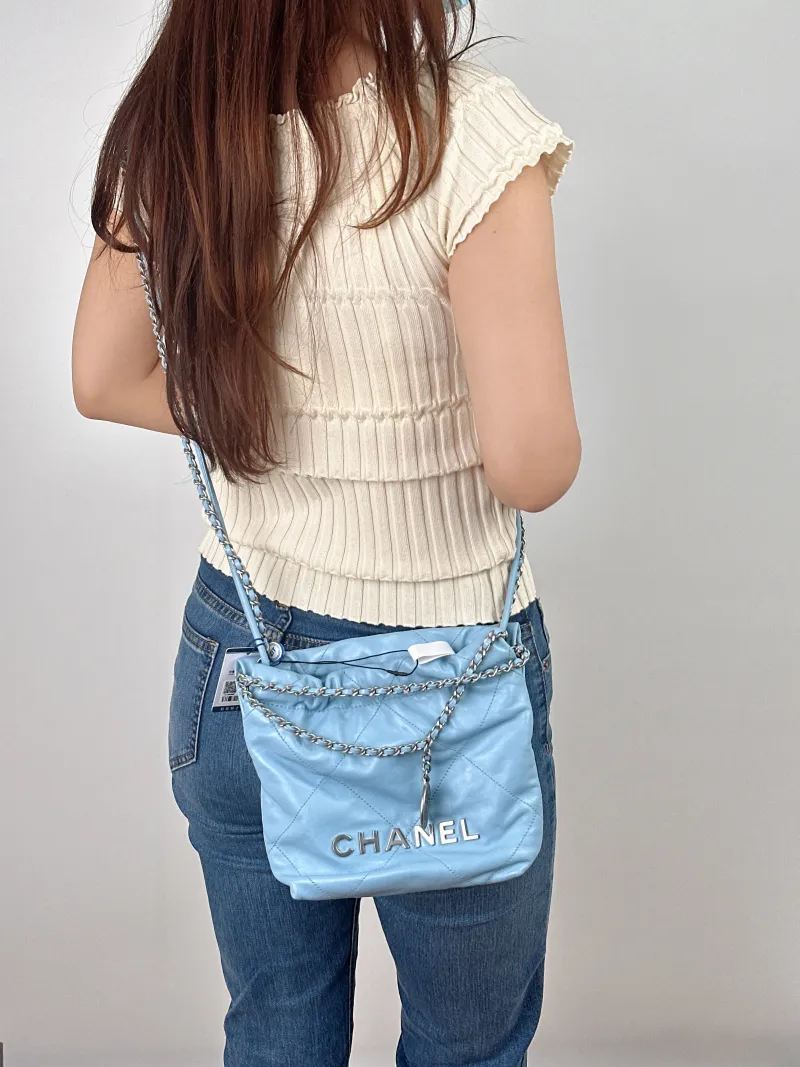 Chanel Shoulder Bag22Bag Blue CC alfskinmini20 × 6 × 19 cm — on-model view 2 of 2