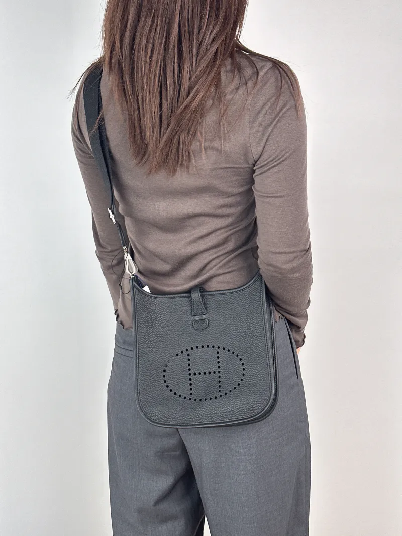 Hermès Crossbody Bag Evelyne 23 23Black TC Calfskin One Size23 × 6 × 24 cm — on-model view 1 of 2