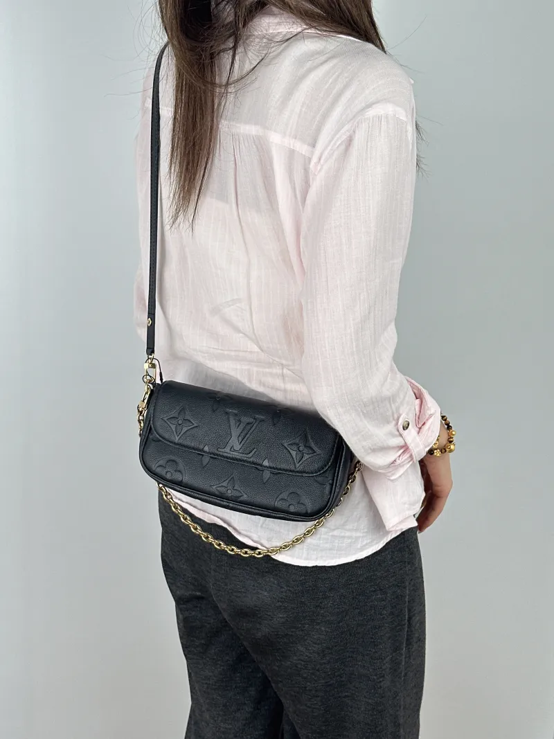 Louis Vuitton Crossbody Bag IVY Black Empreinte Embossed Calfskin Small 23.5 × 4.3 × 12 cm — on-model view 1 of 2