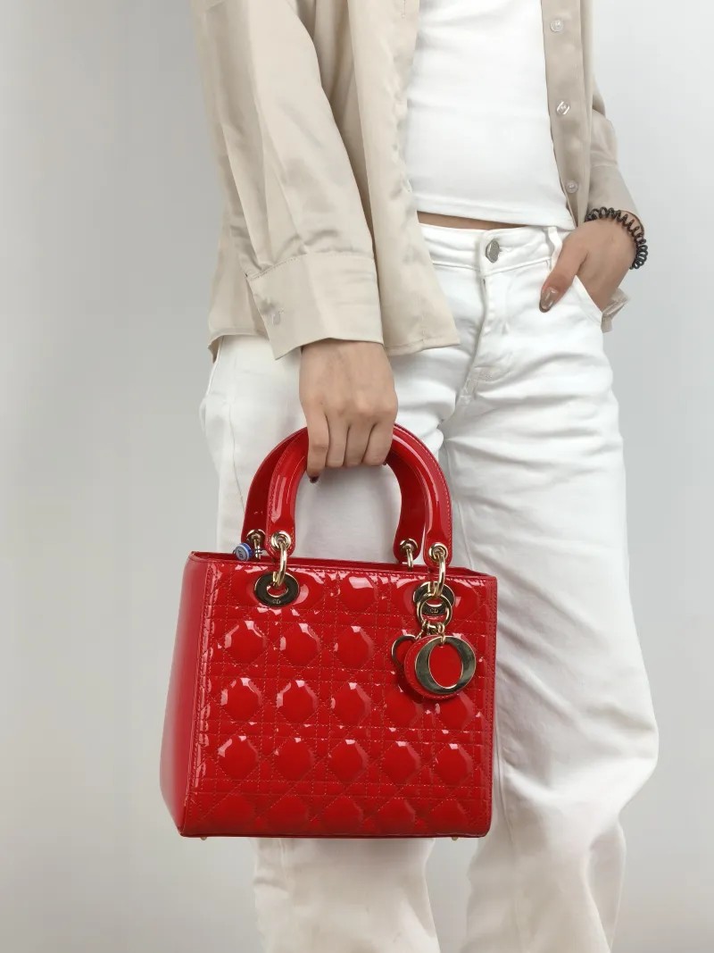 DIOR Top Handle Bag Lady Lady Dior Bag Red Patent Leather Medium 24 × 12 × 21 cm — on-model view 1 of 2