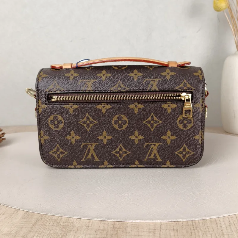 Louis Vuitton Crossbody Bag Pochette Métis East West Monogram PVC Small 21.5 × 6 × 13.5 cm — cover view 2 of 5