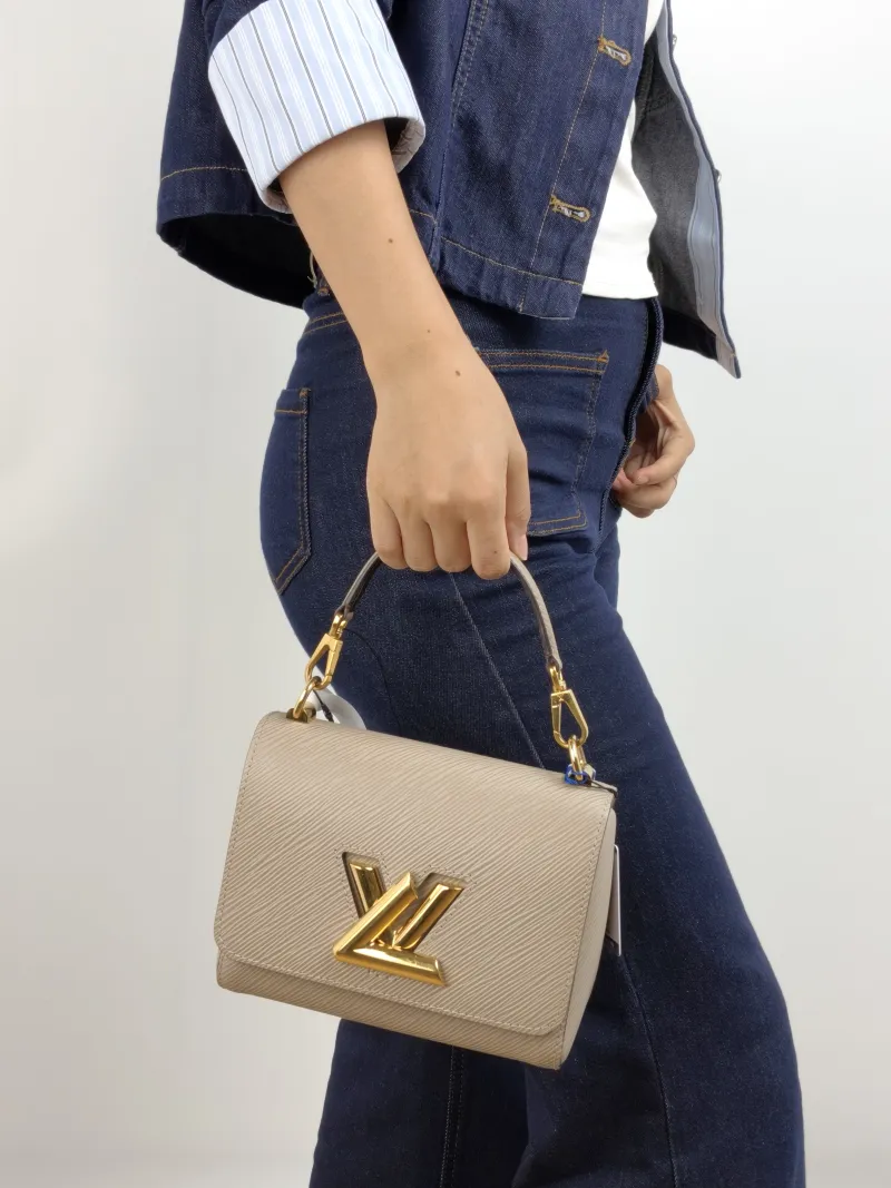 Louis Vuitton Crossbody Bag Twist Epi Embossed Calfskin Small 19 × 9 × 15 cm — on-model view 1 of 2